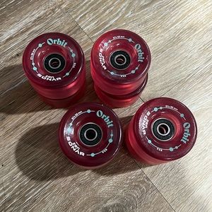Orbit pink gummy roller skate wheels with bearings